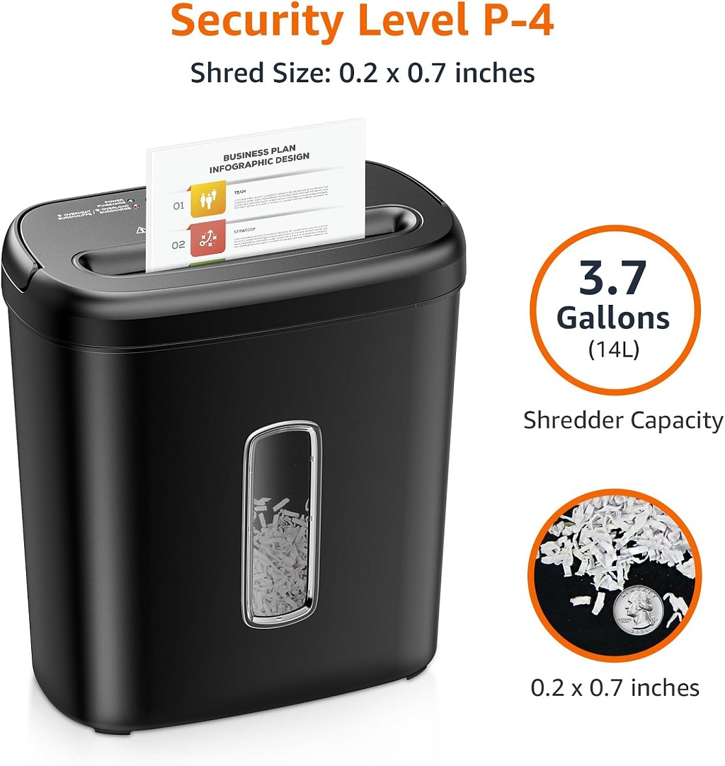 Black Amazon Basics 8-Sheet Cross Cut Shredder designed for shredding paper and credit cards, featuring a sleek, compact build with a visible top feed slot and wastebasket.