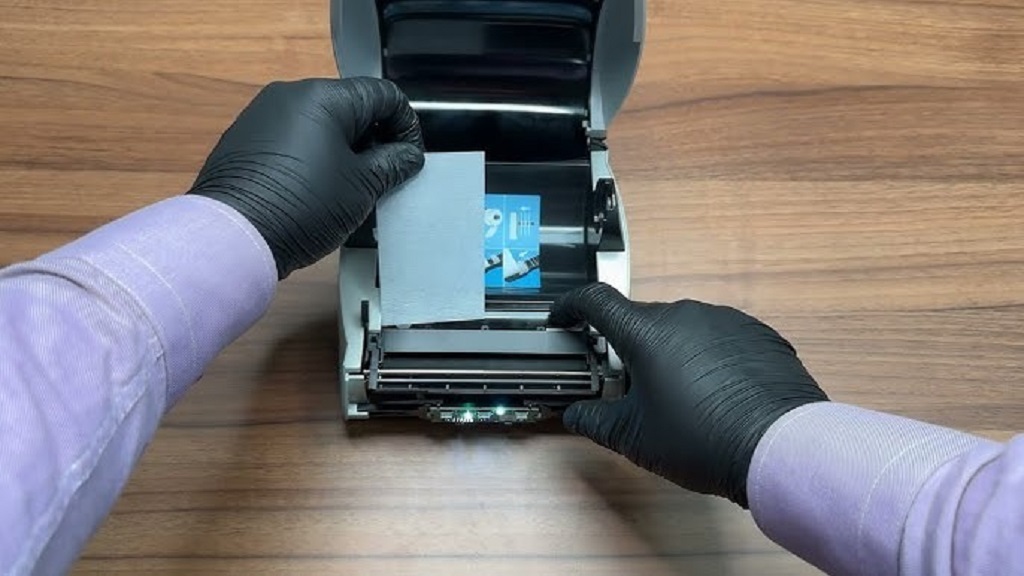 Can I use water to clean the DYMO LabelWriter print head