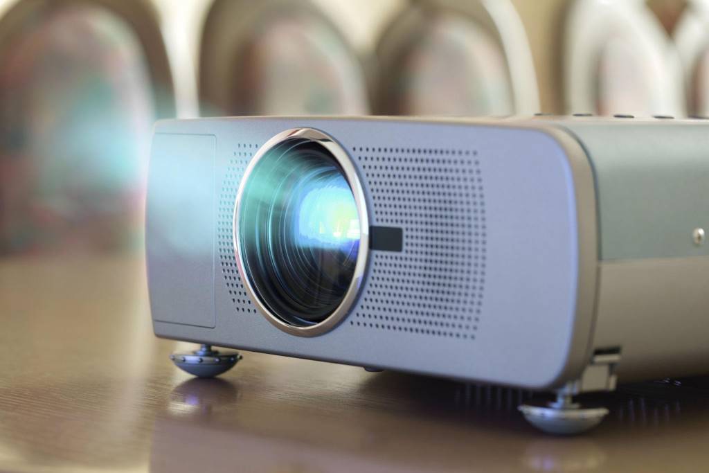 Business conference with screen projector