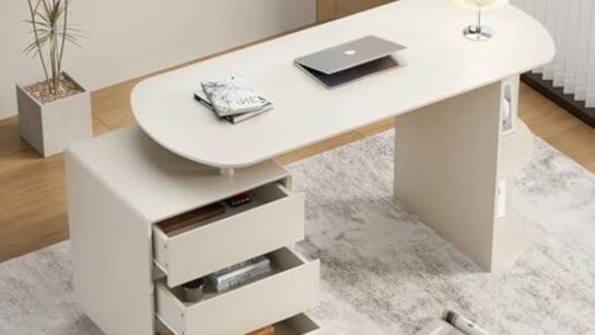 Comfortable office desk with storage drawers, chair, and tidy workspace