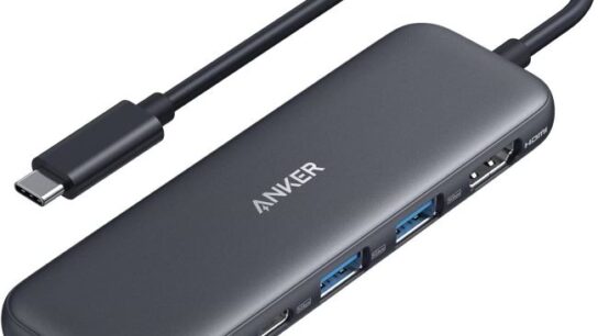 Anker 5-in-1 USB-C hub connected to a laptop with HDMI, USB-A, and USB-C ports
